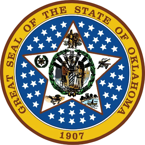 Great Seal of Oklahoma with Labor Omnia Vincit motto at the bottom